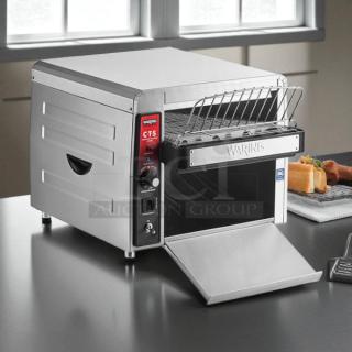 Waring CTS1000 commercial conveyor toaster in excellent condition, 120V, with control panel and open tray, tested and working.