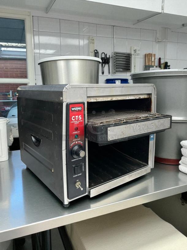 Waring CTS1000 Commercial Conveyor Toaster, 120V, in excellent condition, tested and working; control panel with settings visible.