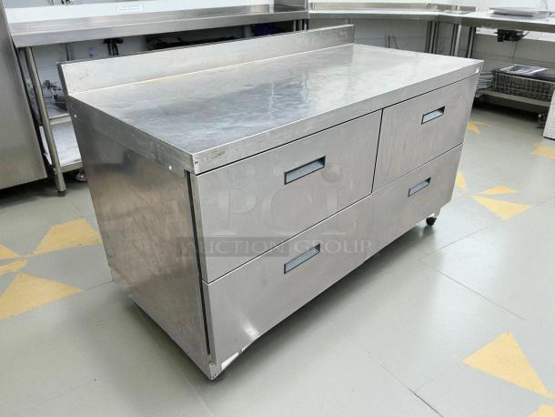 Delfield STD4464NP 60 1/8" worktop refrigerator with four drawers and 4" backsplash in stainless steel, tested and working.