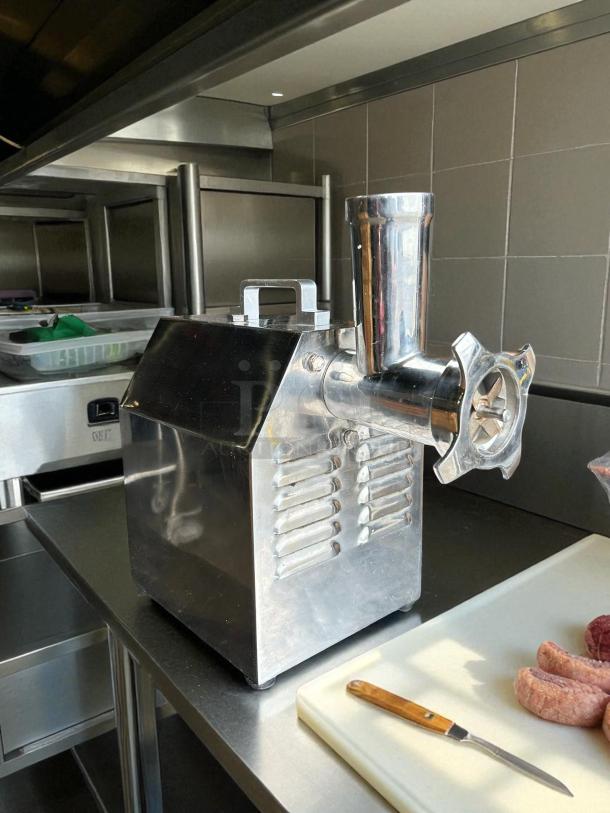 Avantco MG12R #12 Meat Grinder, 110V, 1 hp, stainless steel, reverse setting, tested and working, excellent condition.