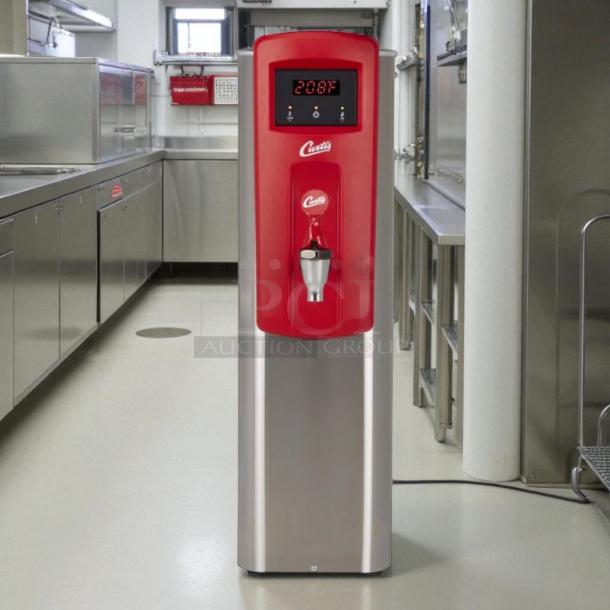 Curtis WB5N hot water dispenser, red/silver, 5 gal capacity, 120-220v/1ph, excellent condition, digital display showing 208°F.