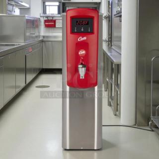 Curtis WB5N hot water dispenser, red/silver, 5 gal capacity, 120-220v/1ph, excellent condition, digital display showing 208°F.