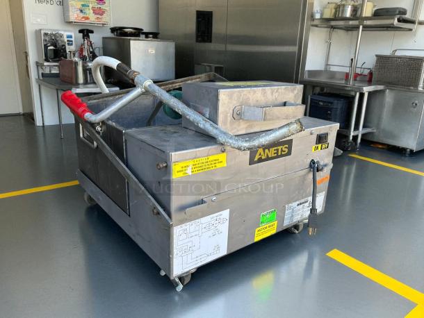 Anets FFM80 80 lb commercial fryer filter, gravity-fed, 120v, tested and working, with visible labels and power switch.