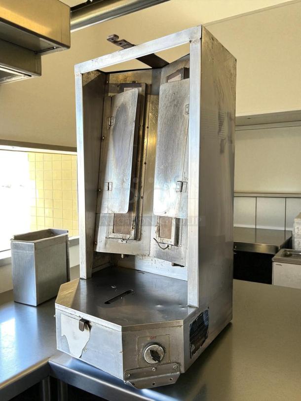 Optimal Autodoner 3PG 65 lb. Gas Gyro Machine, tested and working, stainless steel, good condition, visible control knob.