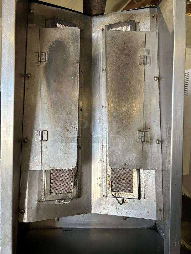 Optimal Autodoner 3PG 65 lb. gas gyro machine in tested working condition. Stainless steel panels, visible wear.