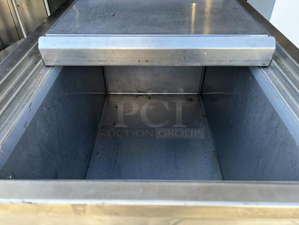 H & K International 34" stainless steel meat freezer, excellent condition, propane powered, 120v 1ph, tested and working.