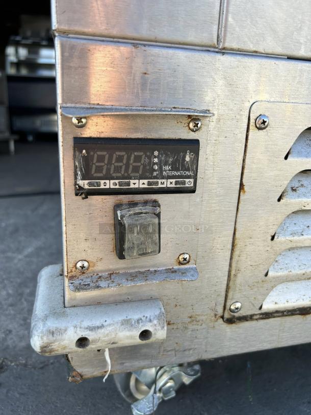 H & K International stainless steel 34" meat freezer, propane (120v. 1ph), digital display, excellent condition, tested working.
