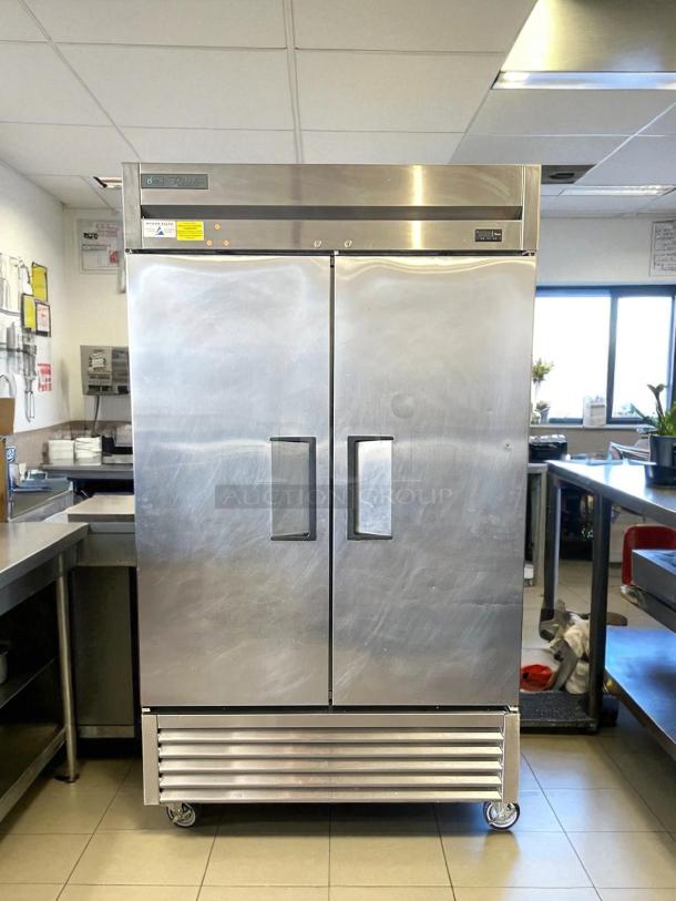 True T-43-HC two-section refrigerator, 47" wide, dual solid doors, stainless steel. Working condition, left/right hinges.