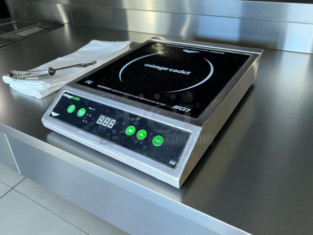 Vollrath 59300 Mirage Cadet 12" x 16" induction range, 1800W, great condition, digital controls, tested, countertop model.