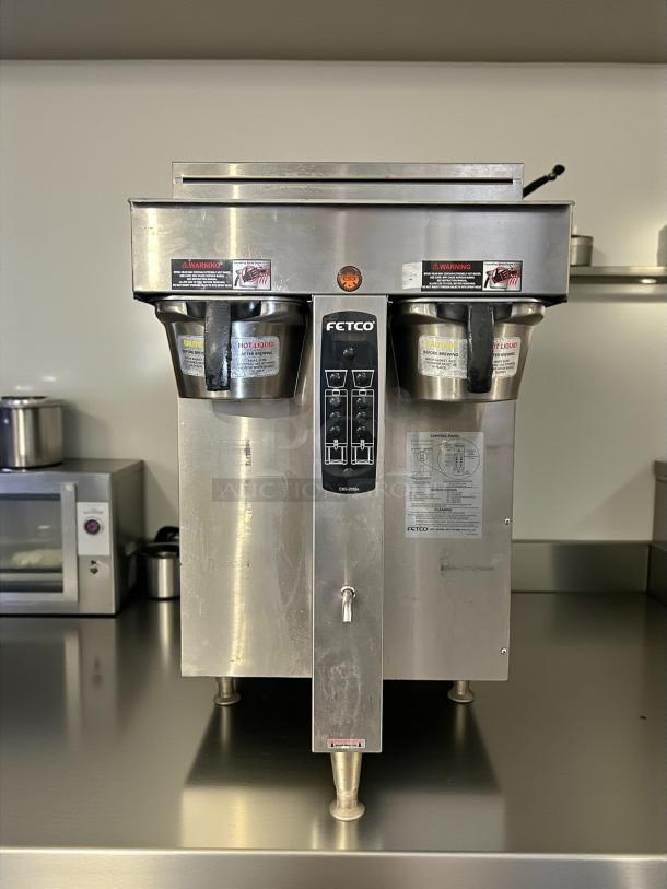 Fetco CBS-2042e E42016 Twin 1 Gallon Coffee Brewer, stainless steel, tested and working, visible warning labels.