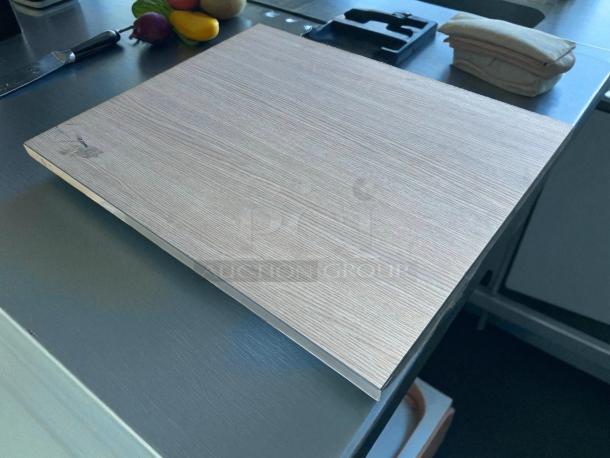 30" x 24" wooden tabletop, 1" thick, excellent condition, suitable for outdoor use, smooth finish.