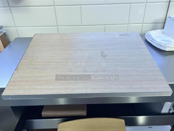 30" x 24" wooden table top, 1" thick, in excellent condition for outdoor use. Smooth finish.