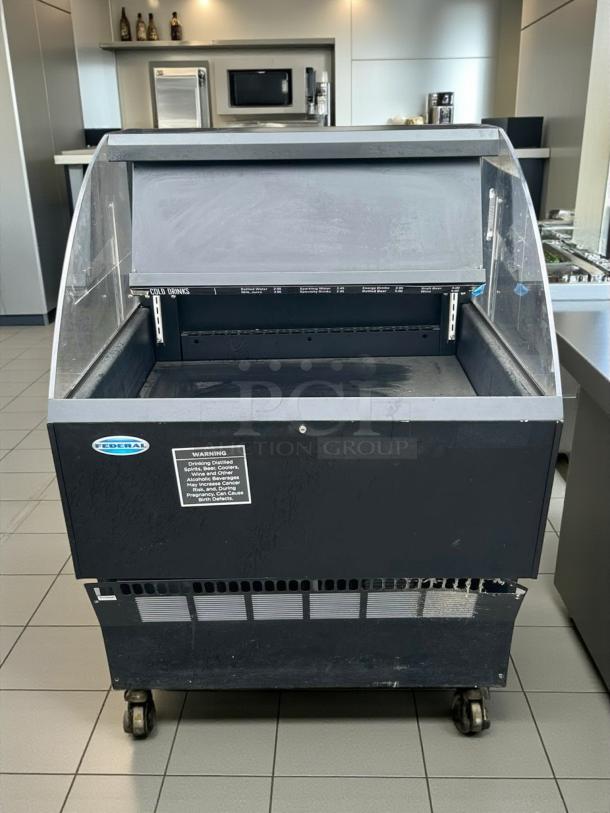 Federal Industries ELPRSS-3 refrigerated merchandiser, 35", excellent condition, tested working. Warning label on front.