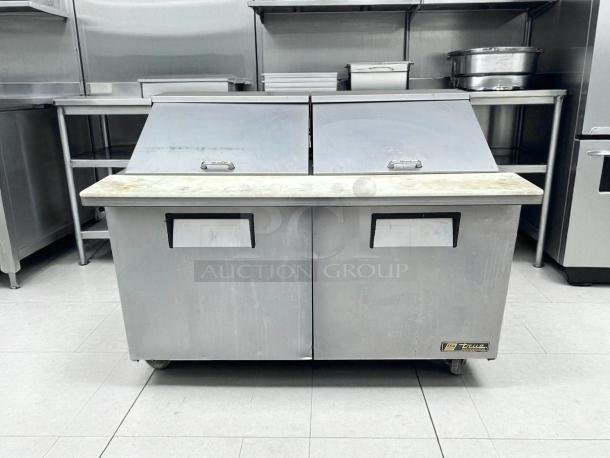 True TSSU-60-24M-B-ST-HC Mega Top Refrigerated Sandwich Prep Table; excellent condition, dual doors, tested.