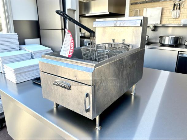 Imperial Range IFST-25 natural gas countertop fryer, excellent condition, includes basket, safety tag attached, 25 lb. capacity.