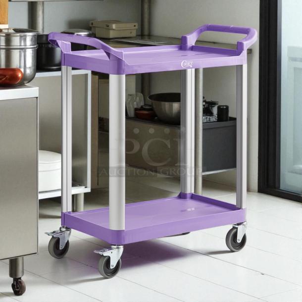 Brand new Choice purple utility cart with two shelves, durable wheels, and ergonomic handles. Ideal for bussing or transport.