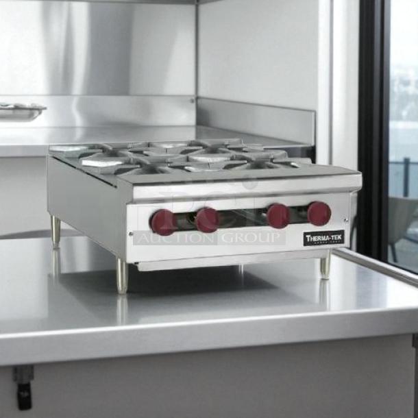Brand new Therma-Tek TCHP24-4 burner countertop gas hotplate with controls, stainless steel, unused condition.
