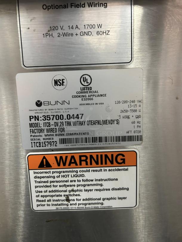 BUNN ITCB-DV Dual-Volt coffee maker in excellent condition, 29" trunk with tray shown. Tags indicate model, power, and warnings.