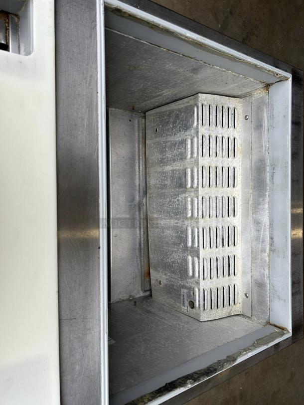 Continental Refrigerator SW27-N-12M-FB sandwich prep table, interior view, stainless steel, tested and working condition.