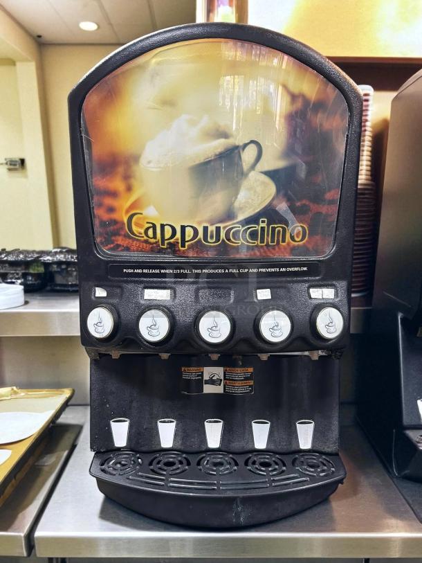Grindmaster PIC5 beverage dispenser, five flavor options, tested and working, features cappuccino graphic, stainless steel base.