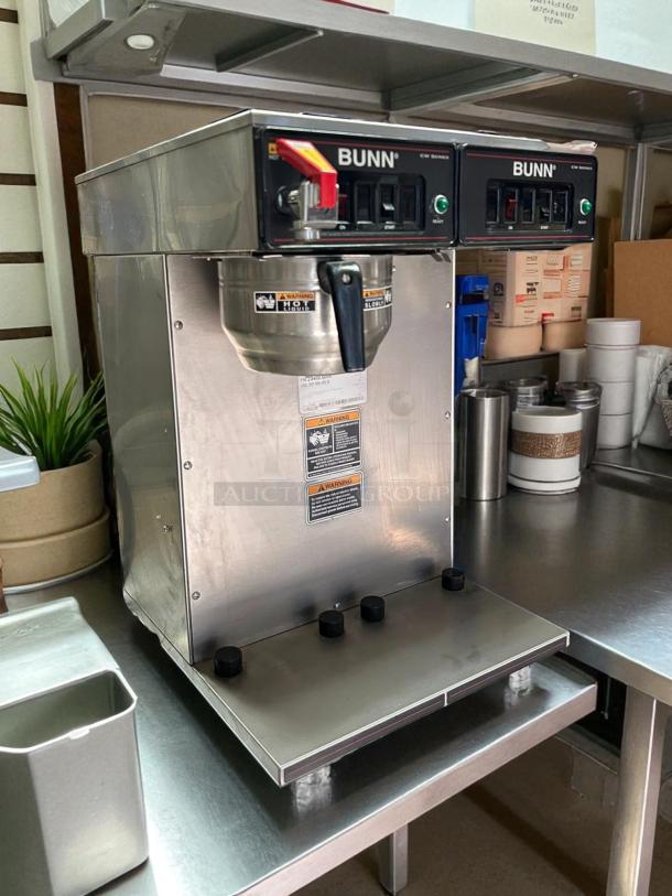 Bunn CWTF-TWIN-APS Double Hopper Coffee Brewer in excellent condition; features dual airpots; tested and working.