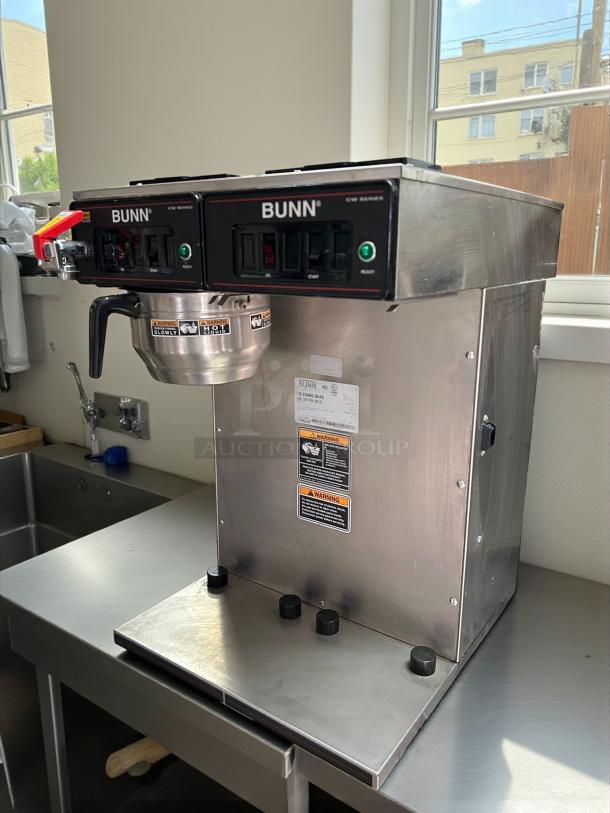 Bunn CWTF-TWIN-APS double hopper airpot coffee brewer in excellent condition; tested and working, stainless steel finish.