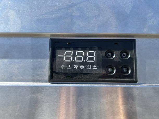 Digital display panel of Turbo Air EF24-1-N-V freezer, showing temperature and control buttons on stainless steel surface.
