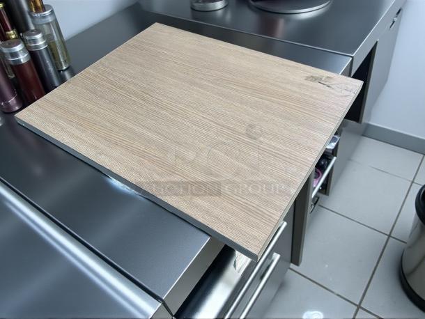 30" x 24" wooden table top, outdoor use, 1" thick, excellent condition, light wood grain finish, angled corner view.