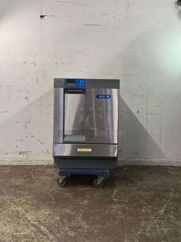 LABCONCO under counter dishwasher, stainless steel finish, digital controls, on wheels, excellent condition.