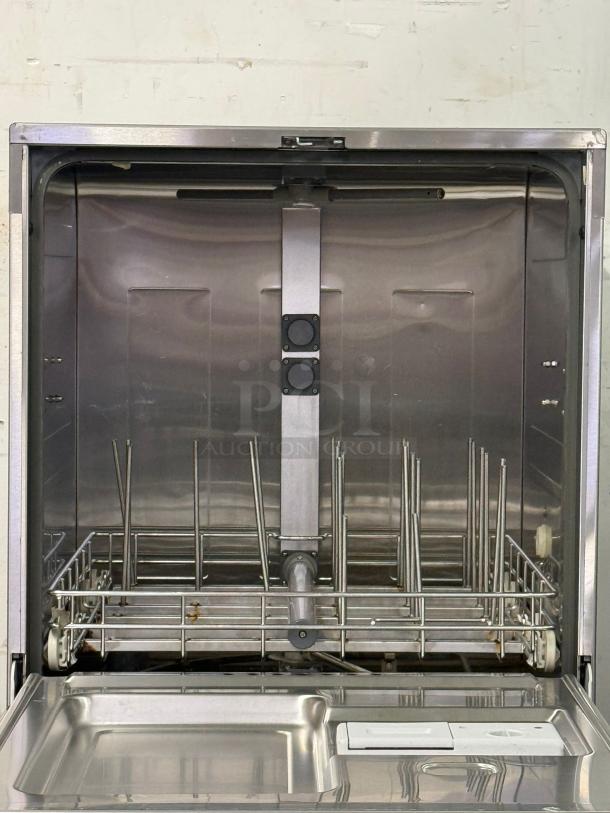 Labconco under-counter dishwasher, stainless steel interior, open door view, sturdy racks, clean condition, industrial design.