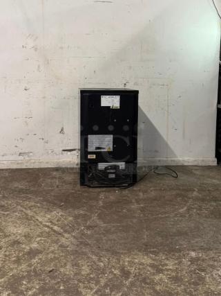 Kegco MDK199SS-01 stainless steel kegerator cabinet, 20" wide. Visible labels and wiring. Appears in good condition.