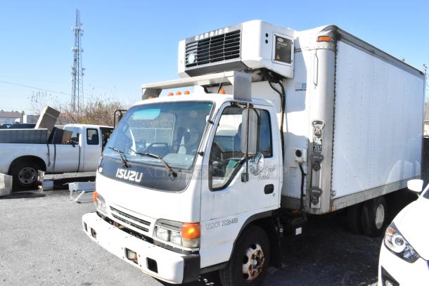 2004 Isuzu Morgan diesel reefer box truck with Carrier Transicold system. Odometer: 215,769 miles. Visible wear.