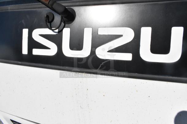 2004 Isuzu Morgan Diesel Reefer Box Truck with Carrier Transicold system, odometer at 215,769 miles. Visible logo.