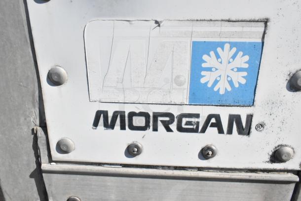Close-up of Morgan logo on a 2004 Isuzu Morgan diesel reefer box truck. Features Carrier Transicold refrigeration system.