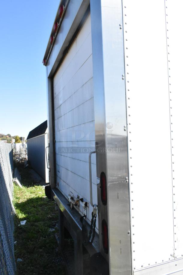 2004 Isuzu Morgan Diesel Reefer Box Truck with Carrier Transicold system; odometer at 215,769 miles, rear view.