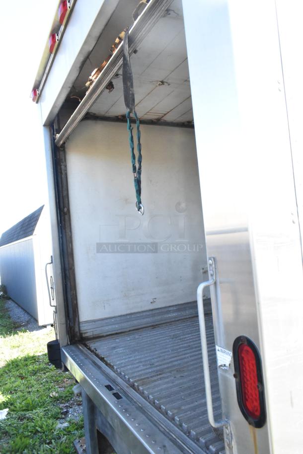 2004 Isuzu Morgan diesel reefer box truck, Carrier Transicold system, open door view, 215,769 miles on odometer.
