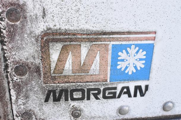 2004 Izuzu Morgan Diesel Reefer Box Truck logo with visible wear. Odometer: 215,769 miles. Carrier Transicold system.