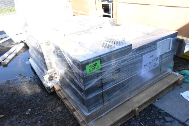 Shrink-wrapped Amerikooler DW081677F-8/8-SC Freezer/Cooler on pallet. "Skid 2 of 2" label. Brand new, minor dents.