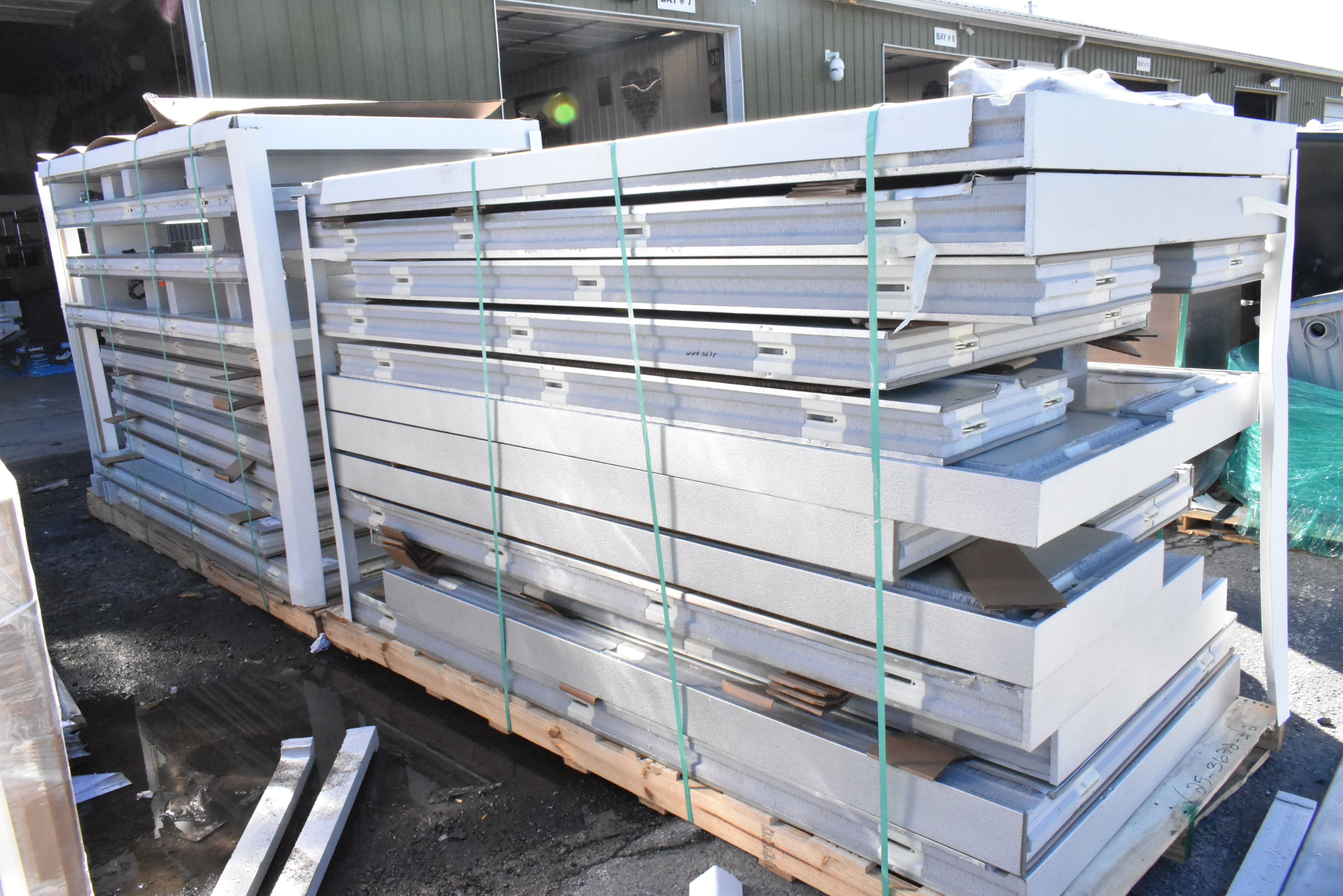 Walk-in cooler panels showing cam lock assembly system