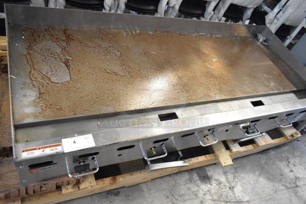 Vulcan AGM72-101 72" stainless steel gas griddle, manual controls, 162,000 BTU, commercial use. Signs of wear, palletized.