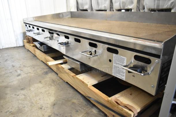 Vulcan AGM72-101 stainless steel 72" commercial gas griddle, manual controls, 162,000 BTU, on wooden pallet, used condition.