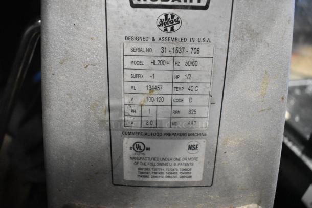 2017 Hobart Legacy HL200 20 Qt dough mixer tag showing model, serial number 31-1537-706, voltage, and certifications.