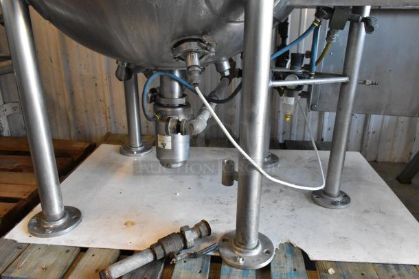Pardo & Sons stainless steel commercial steam kettle with agitator, floor style, in used condition, featuring visible piping and connectors.