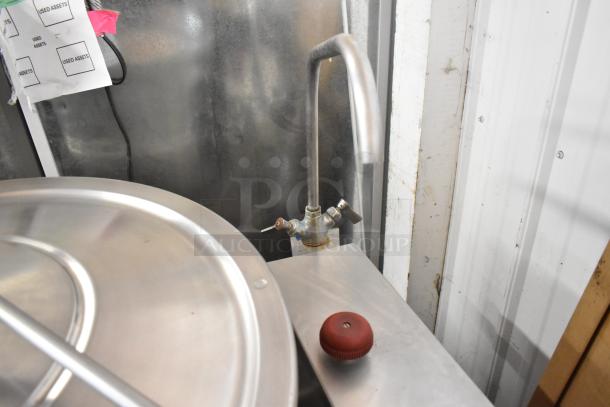 Cleveland KDL-40T stainless steel 40-gallon manual tilt steam kettle. Features control valve, lid, and durable construction.
