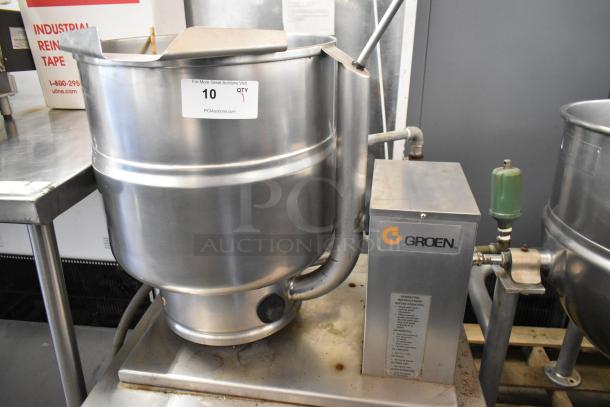 Groen TDB/7-40 stainless steel 10-gallon steam kettle on stand, manual tilt, commercial use, visible operational label.