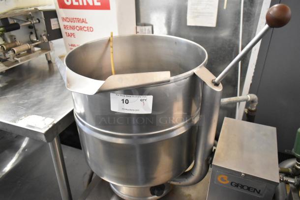 Groen TDB/7-40 10-gallon stainless steel tilt steam kettle on stand, manual lever, excellent condition, auction label visible.