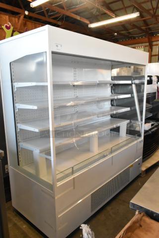 Brand new Avantco 193VOA70W metal commercial 70" white open air merchandiser with LED lighting on casters. 220V, 1 phase.