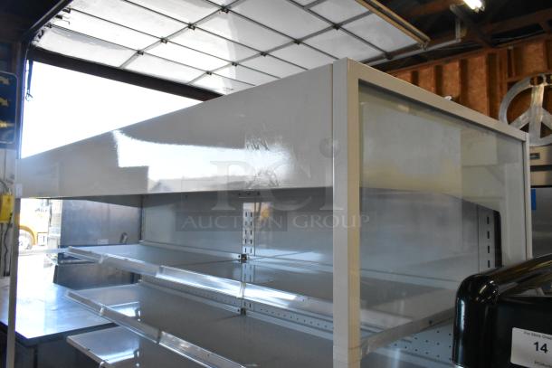 Avantco 193VOA70W vertical open air merchandiser, brand new with scratches and dents, features LED lighting and commercial casters.