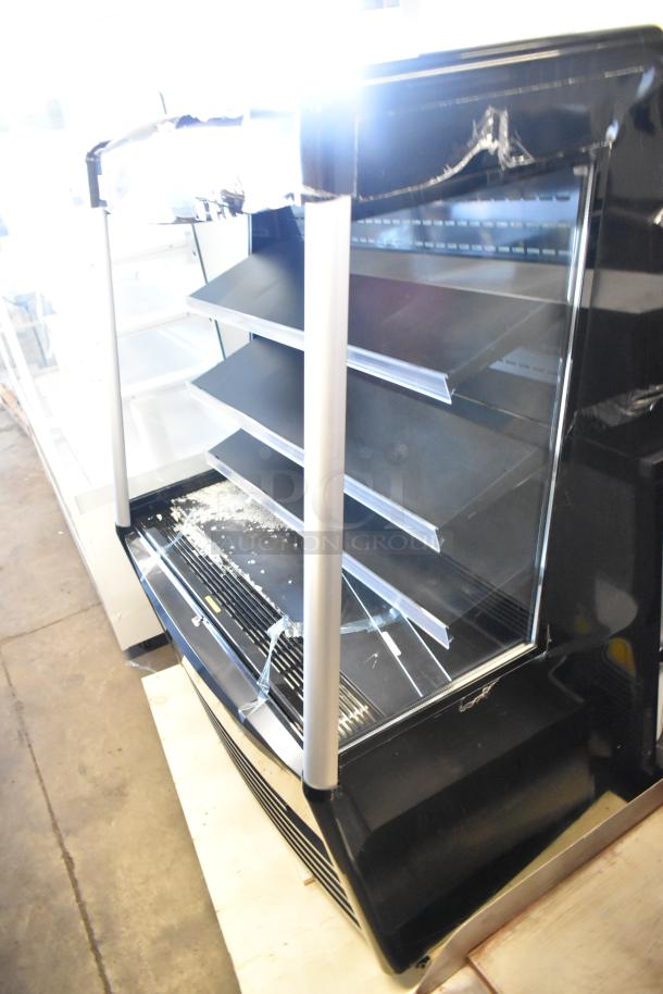 Brand new Avantco 193MAC48HCB 47" black vertical air merchandiser, scratch and dent condition, glass damage visible.