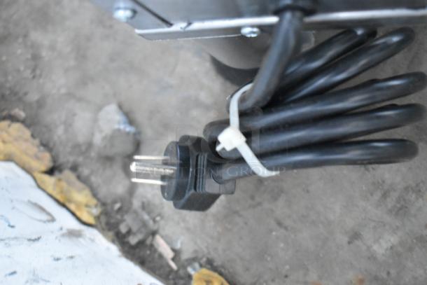 Black power cord with plug for ServIt 423WDSFS2 Stainless Steel Drawer Warmer; brand new, tied with white zip tie.